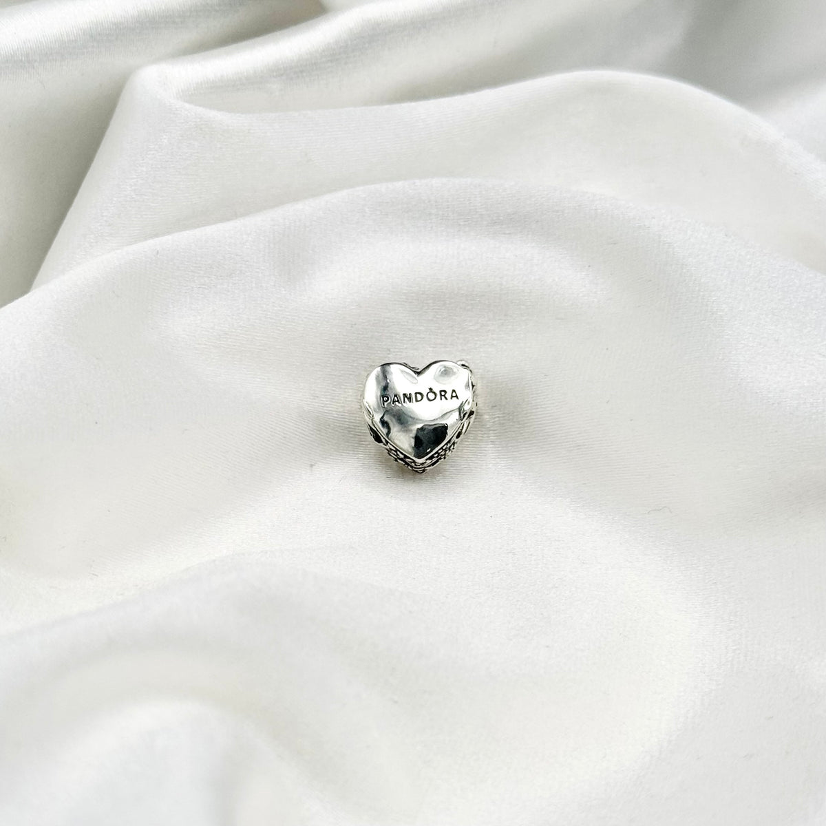 Pandora Flower & Bow Heart Charm in Sterling Silver PDC152