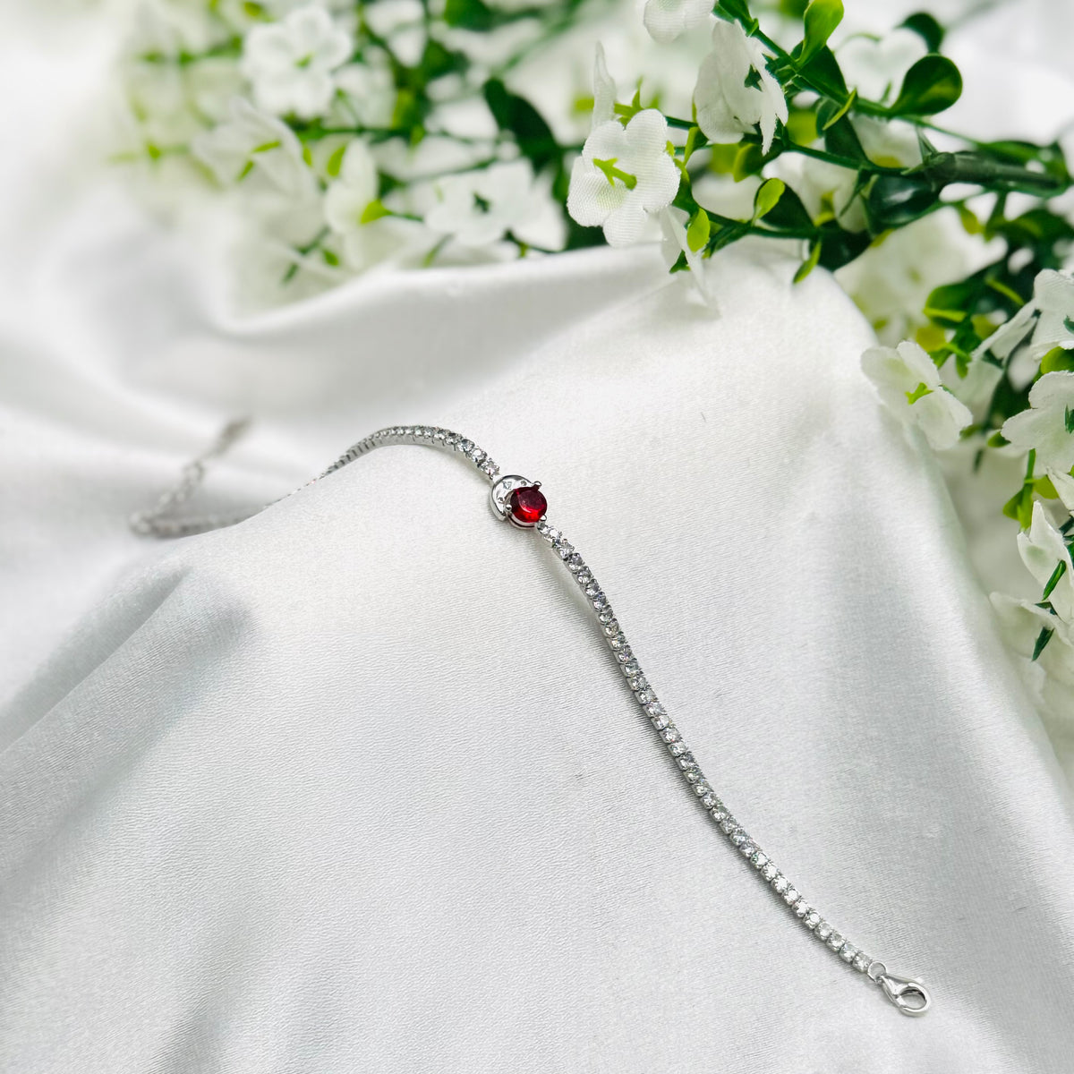 Damen-Tennisarmband mit rotem Solitärstein in 925er Sterlingsilber WBT46