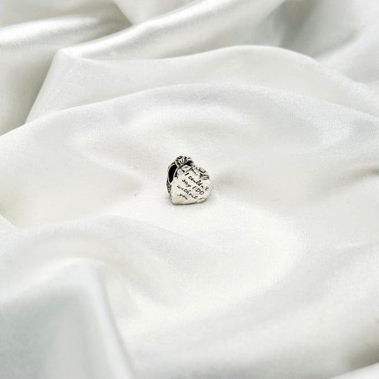 Pandora Flower & Bow Heart Charm in Sterling Silver PDC152